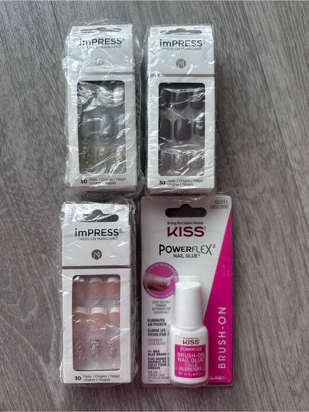 3 sets of imPRESS Press-On Manicure and 1 Kiss nail glue